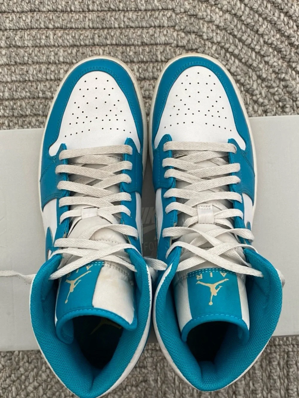 Jordan Air Jordan 1 Mid White and Teal Basketball Sneakers